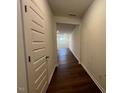 Entryway boasts rich wood floors and access to other rooms within the home at 144 Parker Ln, Mebane, NC 27302