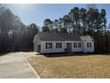 Lovely single-story home with an attached garage and long drive at 209 Magnolia Run Way, Benson, NC 27504