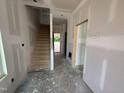 A new construction entryway featuring a staircase and open layout at 315 Chesapeake Commons St # 102, Garner, NC 27529
