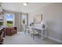 Cozy home office featuring a functional desk, comfortable seating, and natural light at 108 Clementine St # 170, Angier, NC 27501