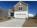 Newly built two-story home with a two-car garage in a residential neighborhood at 1137 Centerview Dr, Nashville, NC 27856