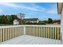 Spacious back deck, perfect for outdoor entertaining, offering scenic views at 104 Eddy Ct, Benson, NC 27504