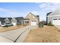 A beautiful view of the home's exterior showcasing well-maintained landscaping and inviting curb appeal at 1255 White Flint Cir, Durham, NC 27703
