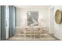 Elegant dining room with modern lighting, stylish decor, and natural accents at 0 Hanover Dr, Sanford, NC 27330