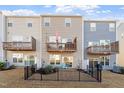 Townhome backyards with fences, decks and patios offer an outdoor space for relaxation at 1014 Falling Rock Pl, Durham, NC 27703