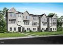 Attractive townhouses with a combination of light gray and white exteriors, complimented by a well-maintained lawn at 1026 Zelkova Lane, Chapel Hill, NC 27517