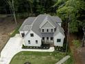 An aerial view showing the beautiful landscaping around the house at 2410 Carpenter Pond Rd, Raleigh, NC 27613