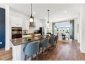 Bright, modern kitchen featuring stainless steel appliances and a center island with barstool seating at 2906 Kempthorne Rd # 54, Cary, NC 27519