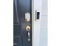 Close-up of a front door with a digital lock and a Ring doorbell at 3019 Vitner Dr, Durham, NC 27704