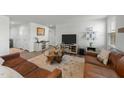 Inviting living room with stylish furniture, decor, and hardwood floors at 45 Florentine Ct, Angier, NC 27501