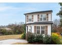 Charming two-story home with a welcoming entrance and well-maintained landscaping at 628 Bragg St, Raleigh, NC 27610