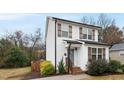 Charming two-story home with a welcoming entrance and well-maintained landscaping at 628 Bragg St, Raleigh, NC 27610