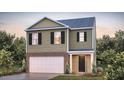 Two-story house showcasing tan siding, brick accents, a white garage door, and black shutters at 258 Palm Dr, Sanford, NC 27332