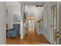 Bright foyer with hardwood floors, staircase and natural light at 28 W Madison, Pittsboro, NC 27312