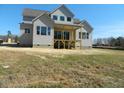 Spacious backyard with an expansive green lawn, ideal for outdoor enjoyment at 5705 Flowery Meadow Ct, Wake Forest, NC 27587