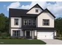 Charming two-story home with a two-car garage, dark trim, stone accents, and a well-maintained lawn at 100 N Stonemill Trl # Homesite 252, Wilson's Mills, NC 27520