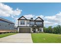 Charming two-story home with well-manicured lawn and inviting curb appeal at 1404 Malcus Ct # 56, Fuquay Varina, NC 27526