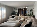 Comfortable living room featuring a large sectional sofa and ample natural light at 1413 Bud Hawkins Rd, Dunn, NC 28334