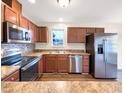 Well-equipped kitchen with stainless steel appliances and ample counter space at 2042 Compacta Dr, Wendell, NC 27591