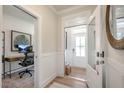 Bright entryway with open access to office space and front door view at 26 Kitty Branch Way, Smithfield, NC 27577