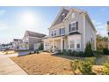 Charming home boasts an inviting curb appeal and beautifully landscaped yard at 2612 Nordmann Fir Rd, Raleigh, NC 27616