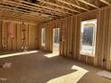 Interior framing featuring the exposed structure, wiring, and the spaces that create the rooms of the house at 88 Windchime Ct, Fuquay Varina, NC 27526