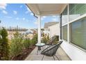 Relaxing front porch featuring outdoor seating and neighborhood views at 456 Highview Dr, Benson, NC 27504