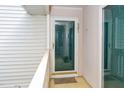 Townhouse entryway featuring a glass door, neutral walls, and a doormat at 521 Renshaw Ct, Cary, NC 27518
