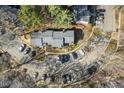 Aerial view showcasing a multi-Gathering complex with ample parking and lush greenery at 7712 Falcon Rest Cir, Raleigh, NC 27615
