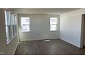 Spacious living room with lots of light and hard wood floors at 937 Emmer St, Rolesville, NC 27571