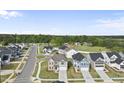 New construction homes are nestled on tree-lined streets in a desirable neighborhood with sidewalks at 15 Nimble Way # 175, Clayton, NC 27520