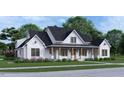 Beautiful home exterior with a covered porch, contrasting black roof and window trim, and lush green lawn, creating a welcoming view at 2600 Banks Rd # 1, Raleigh, NC 27603