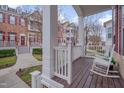 Inviting front porch with rocking chairs, offering a relaxing outdoor space at 10510 Sablewood Dr # 114, Raleigh, NC 27617