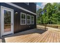 The home has a spacious wooden deck perfect for entertaining or relaxing at 140 E End Ave # 2, Durham, NC 27703