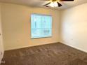 Cozy bedroom with plush carpeting and a bright, windowed view at 1430 Collegiate Cir # 102, Raleigh, NC 27606