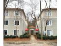 Exterior shot of condos with central walkway at 1430 Collegiate Cir # 102, Raleigh, NC 27606