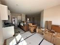 Spacious kitchen featuring a sink, white cabinets, and stainless steel appliances at 45 Trescott St, Smithfield, NC 27577