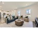 Spacious living room boasting an open floorplan, neutral walls and recessed lighting at 69 Sunshine Rd, Kenly, NC 27542