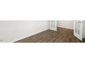 Bright bedroom with hardwood flooring and double french doors at 139 Ethel Ln, Angier, NC 27501