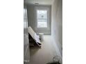 Cozy bedroom with a window providing ample natural light at 1516 Bragg St, Sanford, NC 27330