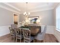 Elegant dining room with tray ceiling, hardwood floors, and stylish chandelier at 0 Old Middlesex Rd Rd, Middlesex, NC 27557