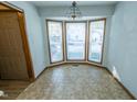 Eat-in kitchen area features a bay window that provides an abundance of natural light at 1004 Hempstede Dr, Zebulon, NC 27597