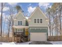 Attractive two-story home with a covered front porch and attached two-car garage at 2209 Woodnell Dr, Raleigh, NC 27603