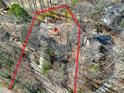 An aerial view showing the property boundaries and surrounding mature trees at 103 Bruce Dr, Cary, NC 27511