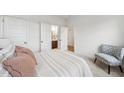 Bedroom with a view of the bathroom and a chair in the corner of the room at 149 Cribbs Ln, Middlesex, NC 27557