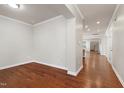 The bright, open living space features gleaming hardwood floors and neutral paint, creating a modern look at 1707 Capstone Dr, Durham, NC 27713