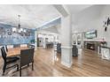 Open concept living area with hardwood floors and fireplace at 20 Crane Dr, Louisburg, NC 27549