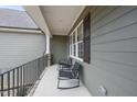 Relaxing covered porch with seating, enhancing the exterior charm at 20 Crane Dr, Louisburg, NC 27549