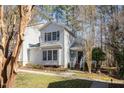 Attractive home with neat landscaping and a well-manicured lawn at 577 Woodbury, Pittsboro, NC 27312