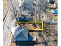 An aerial view of the property lot shows a defined parcel next to a two-story home at 822 Kent St, Durham, NC 27701